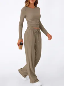 Women casual loungewear set featuring a long sleeve top and comfortable wide leg trousers.