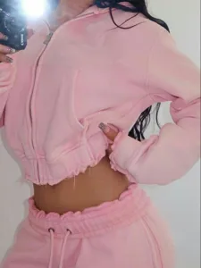 Pink cropped zip-up hoodie and sweatpants set, casual Y2K raw edge two-piece tracksuit outfit.