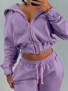 Purple cropped zip hoodie and sweatpants set, casual raw edge two-piece activewear outfit.