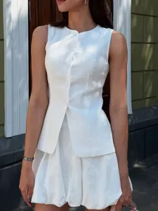 White sleeveless vest and bubble skirt two-piece set, stylish summer outfit detail view.