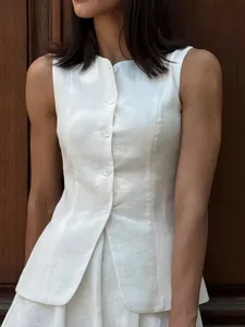 Sleeveless white buttoned vest detail shot, elegant linen-like fabric, minimalist chic.