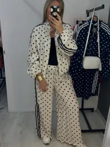 Retro polka dot tracksuit set with zip jacket and wide leg pants featuring side stripes