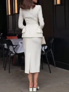 Elegant white French peplum blazer and high waist midi skirt set, perfect for chic style.