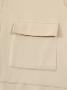 Gros plan détail de la poche de veste en laine homme automne hiver, texture de tissu.