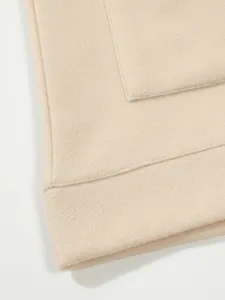 Détail de poche d'ourlet de veste en laine pour hommes automne hiver mode vêtements