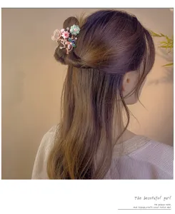 Korean style crystal hair claw clip, elegant floral hair accessories for women and girls.