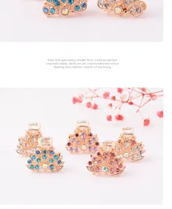 Mini rhinestone hair claw clips, small metal hair accessories for women and girls daily styling.