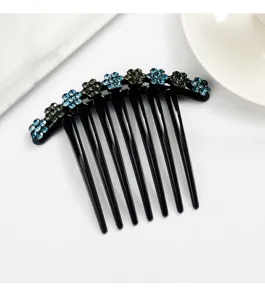 Elegant black rhinestone hair comb with sparkling blue floral crystal design for women chic styling.