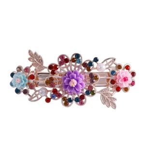Elegant crystal flower hair spring clip for women, gorgeous rhinestone ponytail barrette.