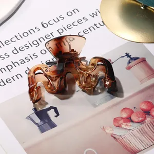 Brown gradient frosted hair claw clip for women, stylish wave shark hair clip for thick hair.