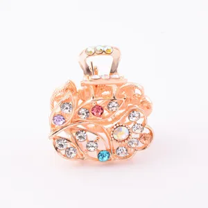 Rose gold rhinestone hair claw clip, small floral hair accessory for women and girls daily use.