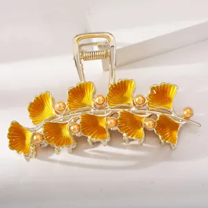 Vintage ginkgo blad metalen haarklem, elegante gouden haaienklem voor dames haarstijl.