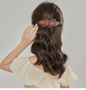 Exquisite rhinestone flower spring hair clip detail, elegant retro hair accessory.