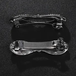 Silver rhinestone bow spring hair clip for women, sparkling crystal hair accessory ponytail.
