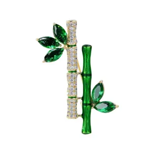 Elegant emerald-style zircon bamboo brooch, exquisite gold-plated crystal pin for women daily.