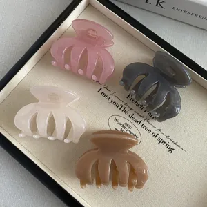 Korean style high-end small pumpkin hair claw clip, chic autumn fashion design shark clip.