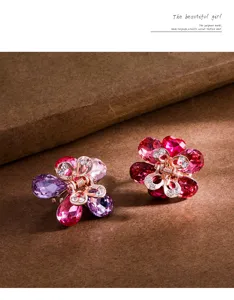 Mini metal flower hair claw clips with sparkling rhinestones, perfect for elegant daily hairstyles.