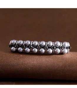 Detailed view of the gray pearl rhinestone hair clip, elegant decorative spring hair accessory.