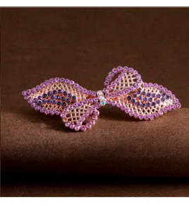 Elegant rhinestone bow hair clip for women, sparkling crystal spring barrette for daily wear.