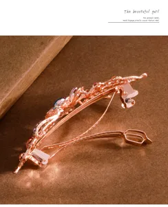 Retro rhinestone spring hair clip detail shot, elegant women metal hair accessory jewelry.