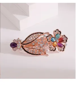 Elegant rose gold rhinestone crystal hair clip with colorful gems and floral design for women.
