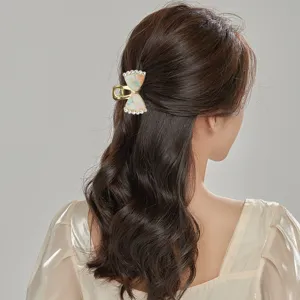 Elegante molletta per capelli con fiocco in strass da donna, fermaglio in lega dorata per acconciature.