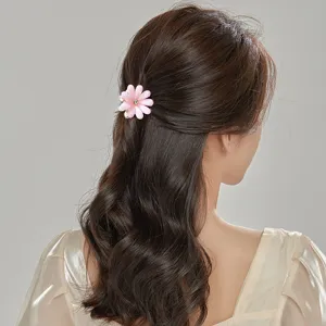 Pink flower hair claw clip for women, cute rhinestone metal hair accessory for daily styling.