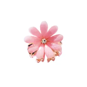 Pink flower hair claw clip with crystal rhinestone and alloy base for women sweet styling.