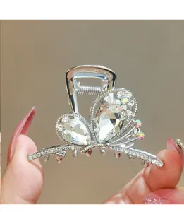 Silver crystal butterfly hair claw clip for women, sparkling rhinestone hair jaw.
