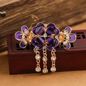 Retro lila Blumen Haarklammer mit Strass und Quasten Anhänger für elegante Damenfrisuren.