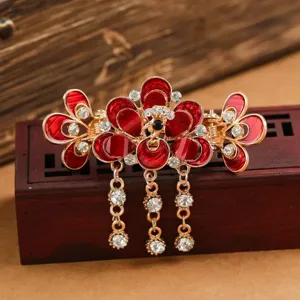 Pince a cheveux retro a pampilles avec email rouge et strass eclatants pour femmes.