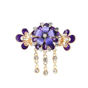 Vintage lila Blumen Haarklammer mit Strassquasten und elegantem goldenen Finish.