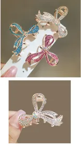 Close-up detail of sparkling rhinestone bow hair claw clip, elegant metal shark clip accessory.