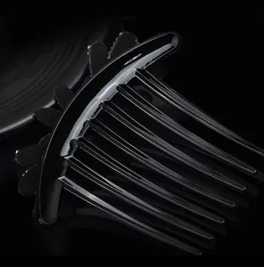 Black glossy hair comb multi-tooth hair fork elegant rhinestone floral hair accessory detail view
