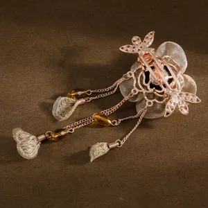 Elegant retro Chinese style tassel hair clip with mesh flower and beads for women daily wear.
