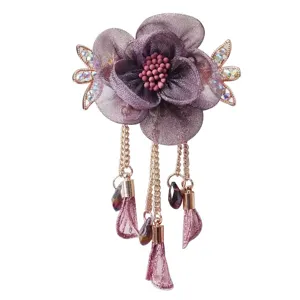 Elegant purple fabric flower hair clip with rhinestones and metal tassel chains for women.