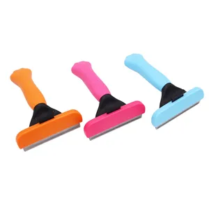 Professional pet deshedding tool with stainless steel teeth and colorful paw handles for cats.