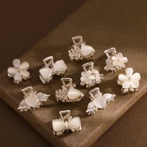 Ensemble de petites pinces à cheveux en métal avec pierre d'œil de chat et perles de cristal.