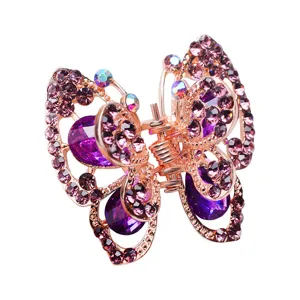 Rose gold butterfly hair claw clip with sparkling purple rhinestones for women styling