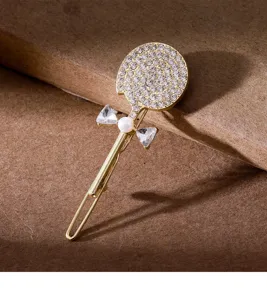 Sparkling gold lollipop rhinestone hairpin detail, sweet pearl bangs clip for women.