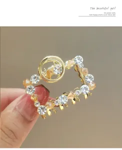 Gold rhinestone hair claw clip, elegant geometric metal hair accessory for women and girls daily wear.