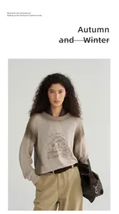 Detailed view of women gradient knit sweater with cozy crewneck design for autumn daily wear.