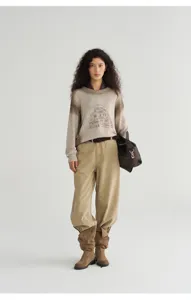 Gradient tie-dye crewneck knit sweater detail view, showcasing soft slouchy style.