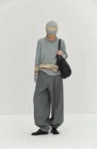 High-waisted wool-blend pleated harem pants for women, loose fit, stylish autumn winter trousers.