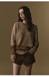 Brown crewneck knit sweater with pattern and tweed shorts set. Elegant retro style.