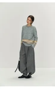 Nordic style fair isle thick knit sweater detail shot showcasing cozy minimalist winter fashion design.