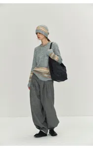 Detailed view of the Nordic style Fair Isle knitted sweater outfit worn by model.