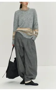 Minimalist Nordic style Fair Isle thick knit sweater paired with stylish pleated wide leg trousers.