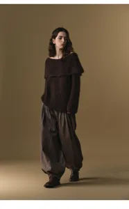 Wool blend high-waisted pleated harem pants for women, elegant winter style detail view.