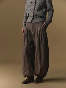 Wool blend high waist pleated harem pants for women, stylish autumn winter trousers.